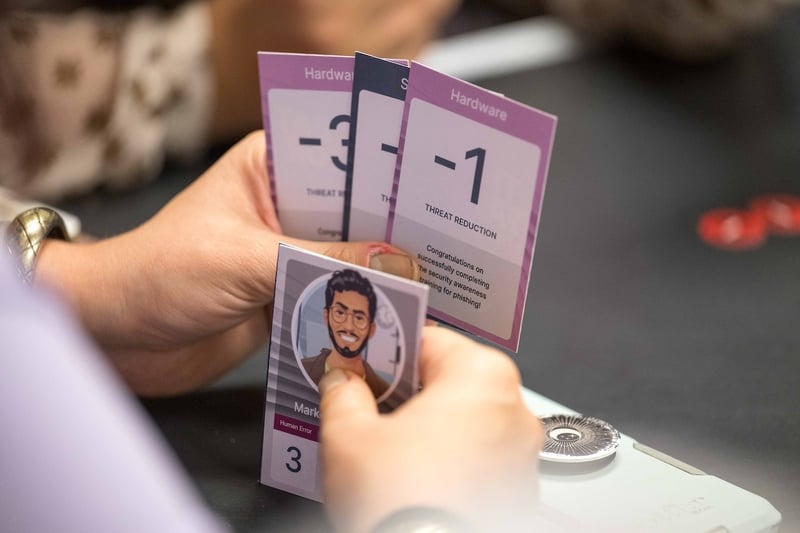 hands holding game cards