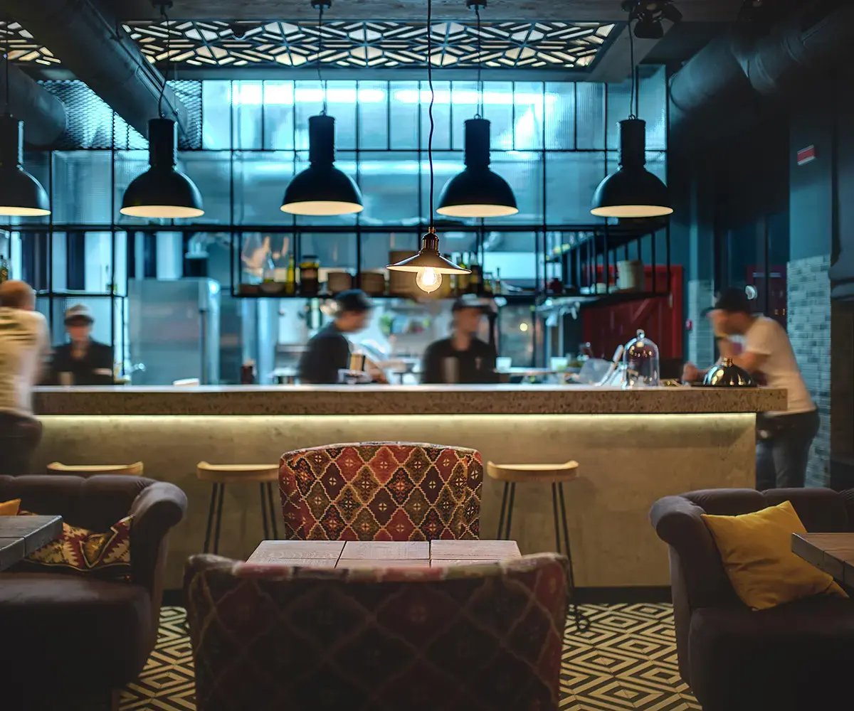 Modern restaurant interior with dim lighting.